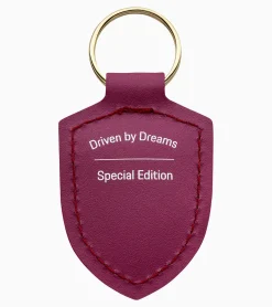 Schlusselanhanger Wappen „Driven By Dreams" – 75Y