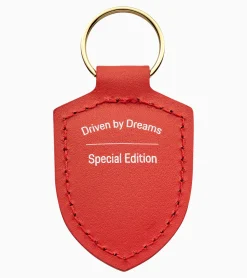 Schlusselanhanger Wappen „Driven By Dreams" – 75Y